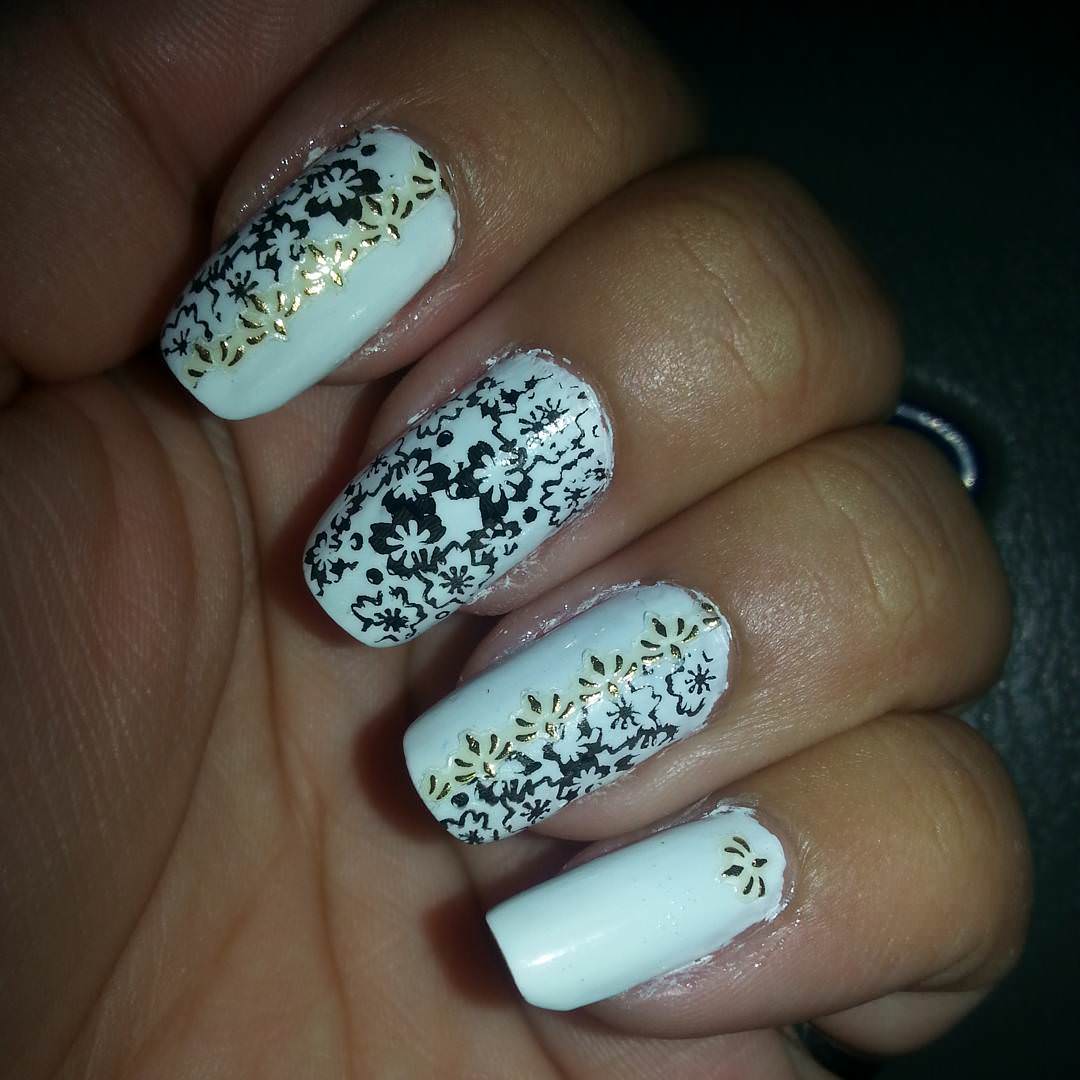 glitter black and white nail design