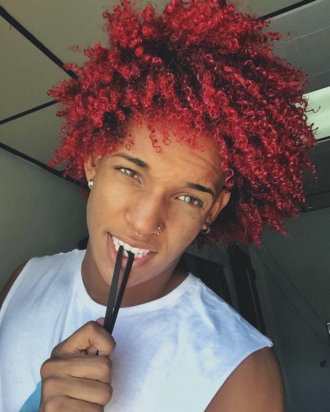 red colored afro curl men