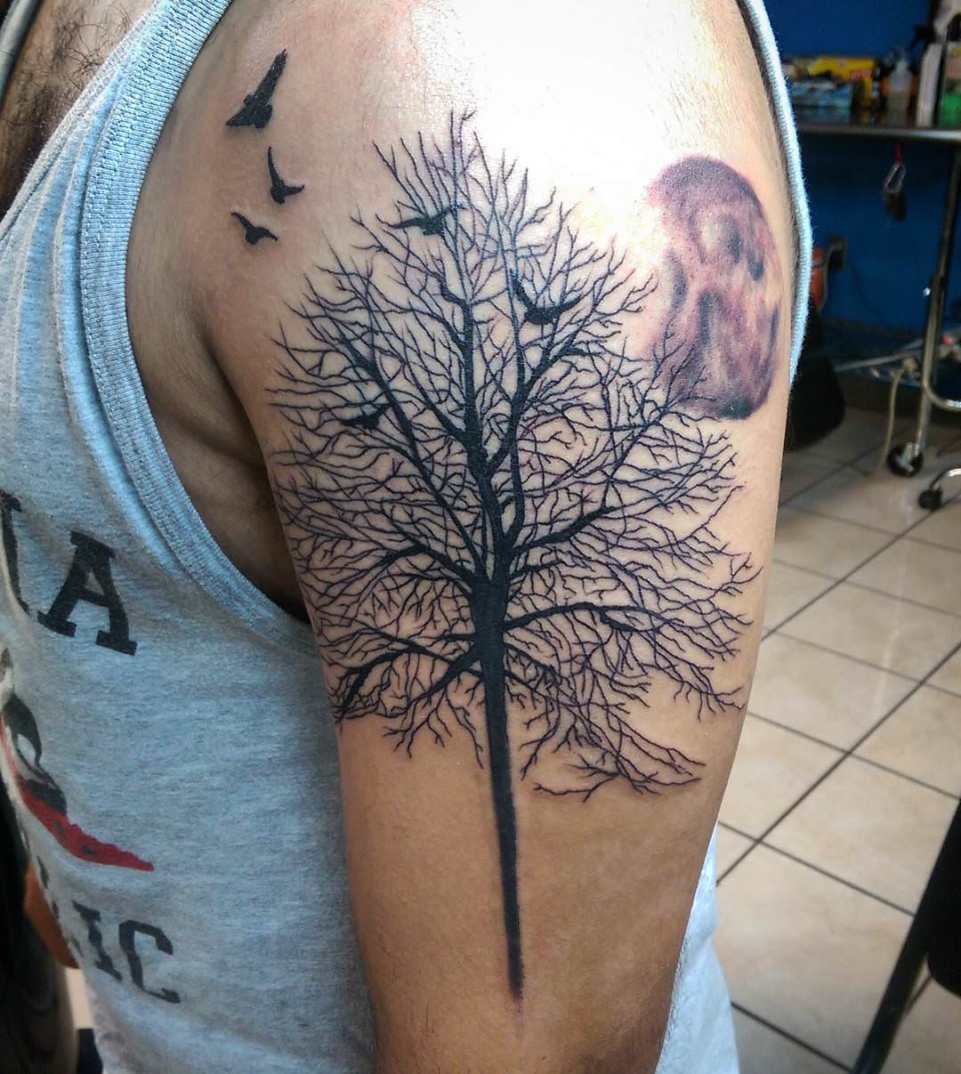 tree birds tattoo design for men