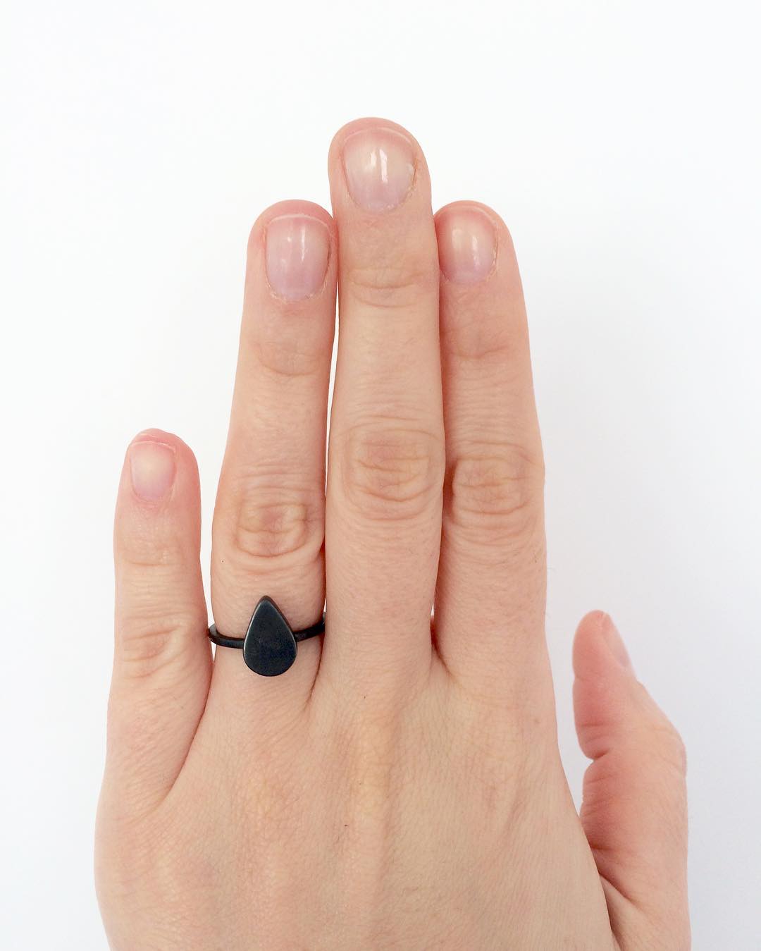 black pear shaped ring
