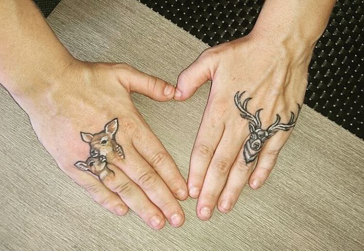 tiny deer tattoo on fingers