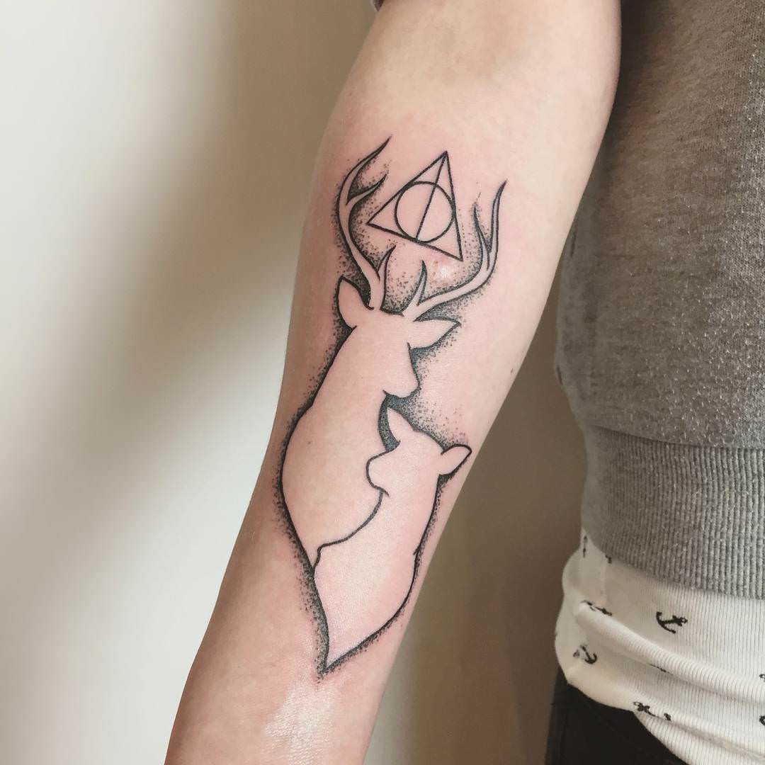 simple stylish deer tattoo on hand