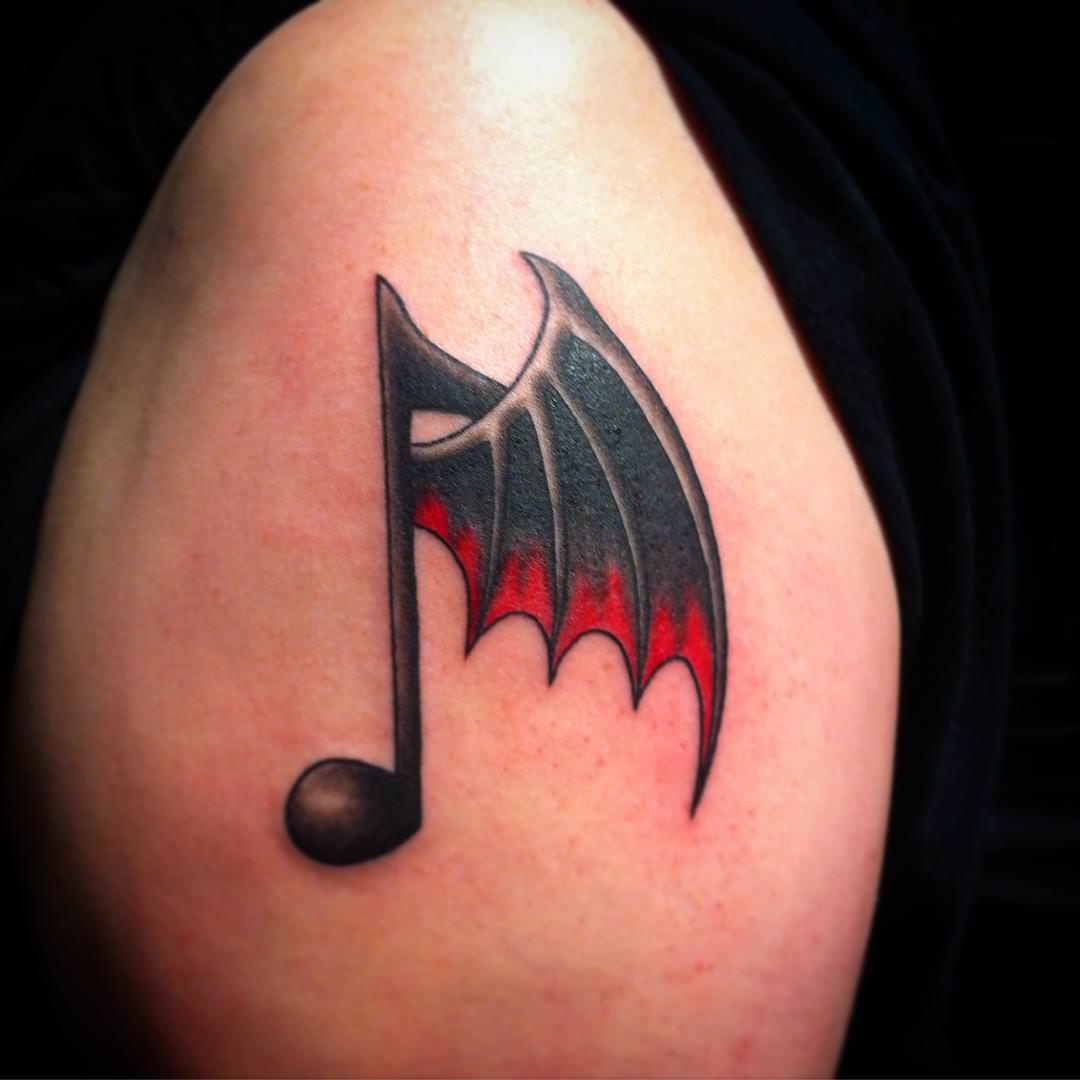unique music symbol tattoo