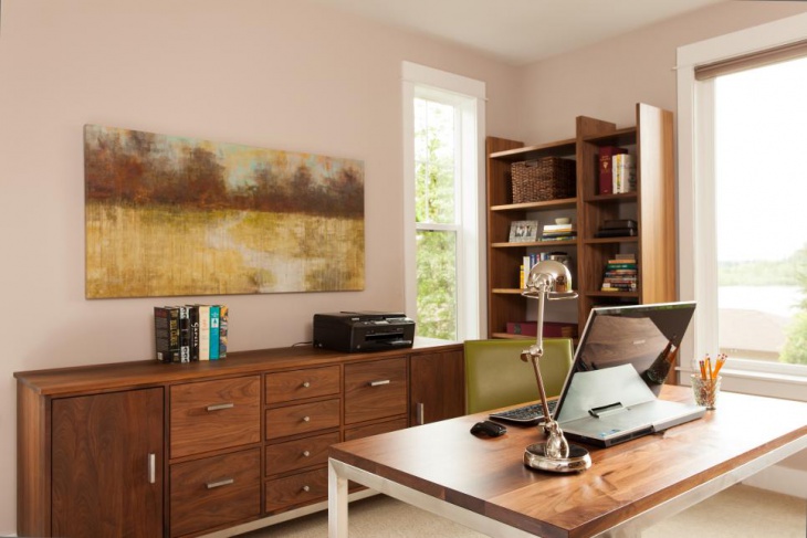 home office with wallnut desk and wooden cabinets