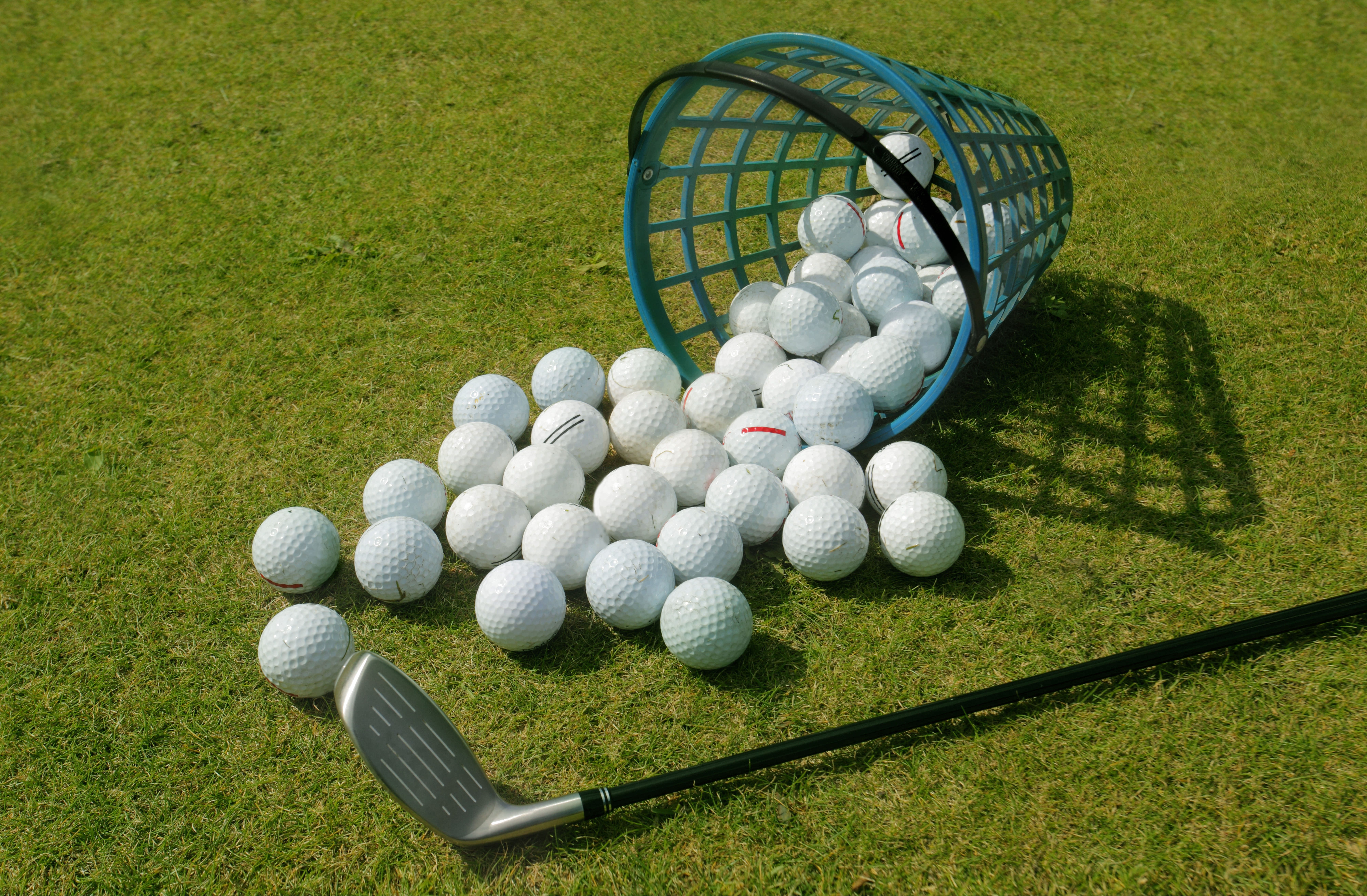 set of golf balls with golf club wallpaper