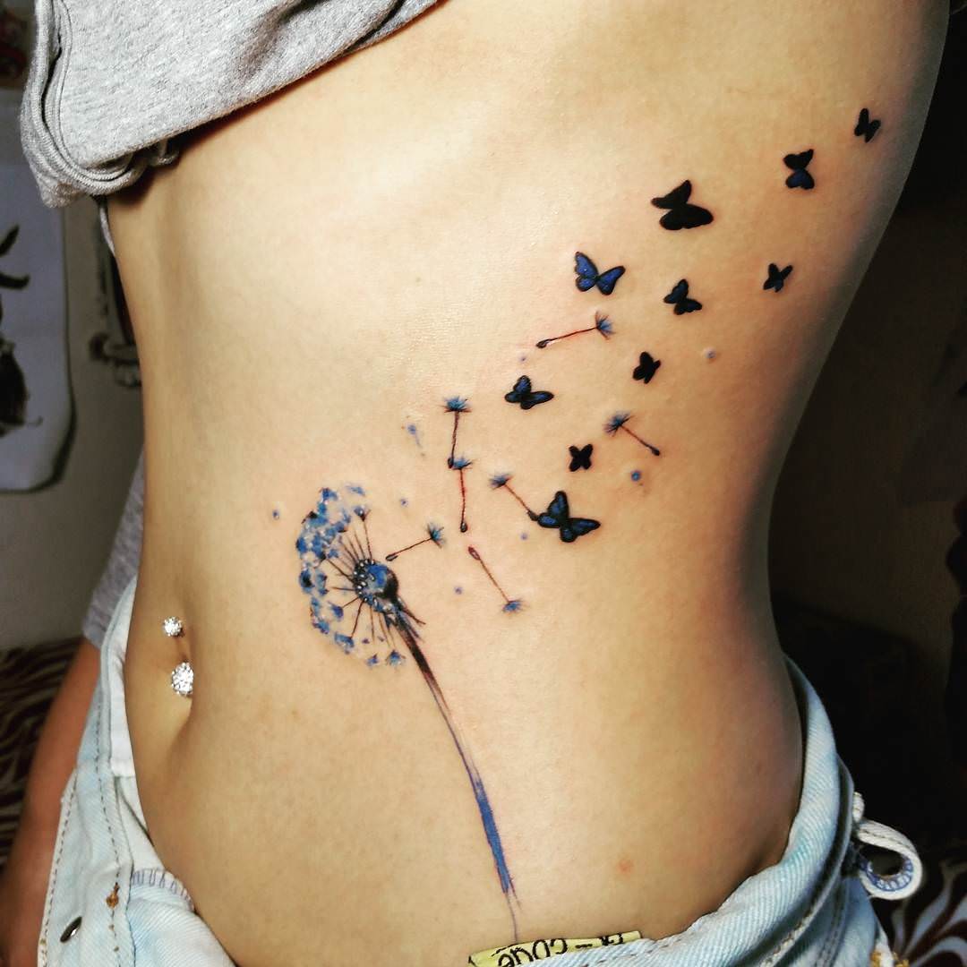 attractive dandelion tattoo