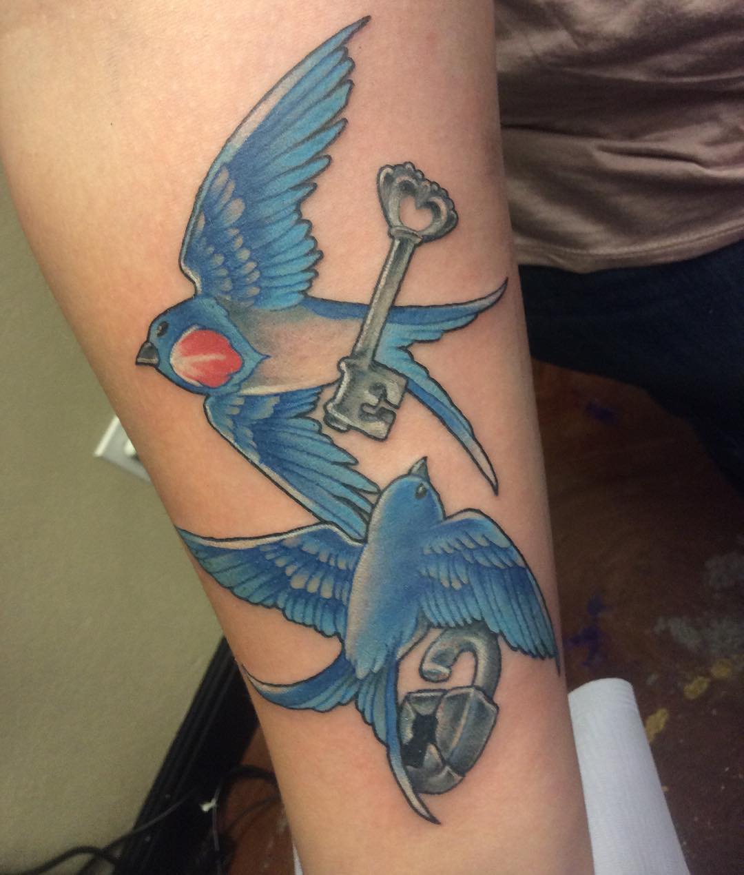 blue sparrows with lock key tattoo