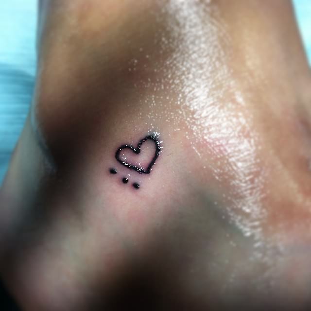 girl heart tattoo