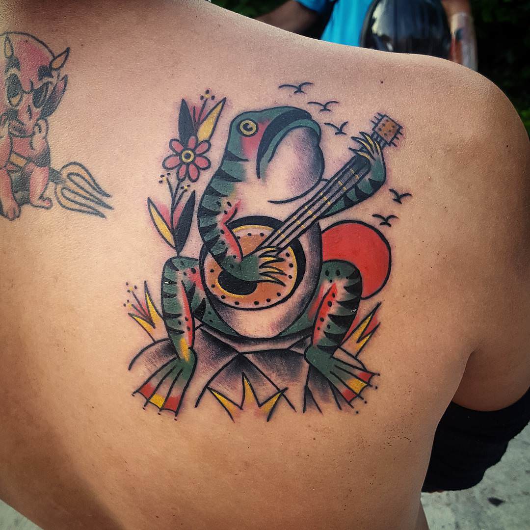 singing frog tattoo design