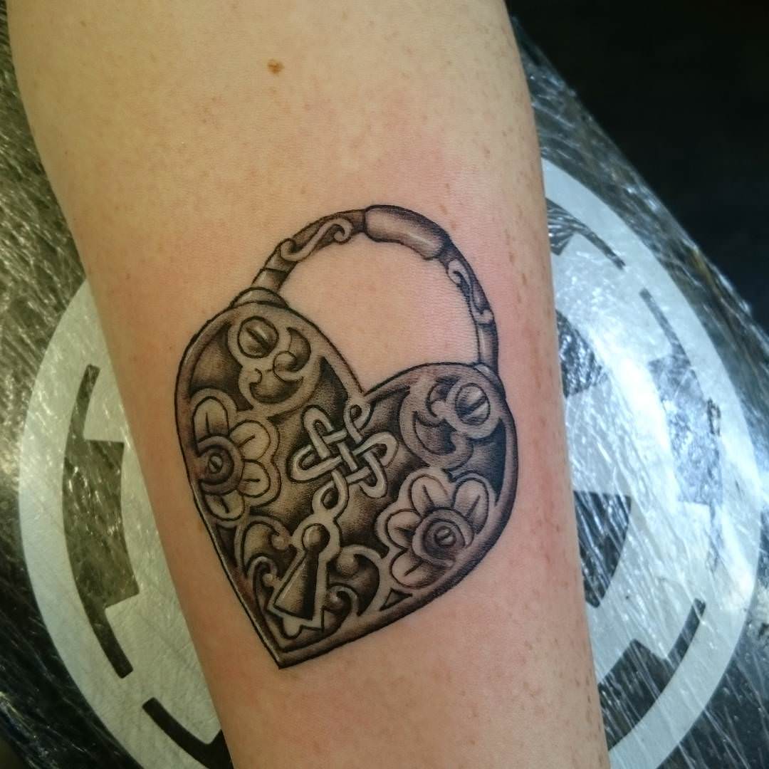 simple heart locket tattoo design