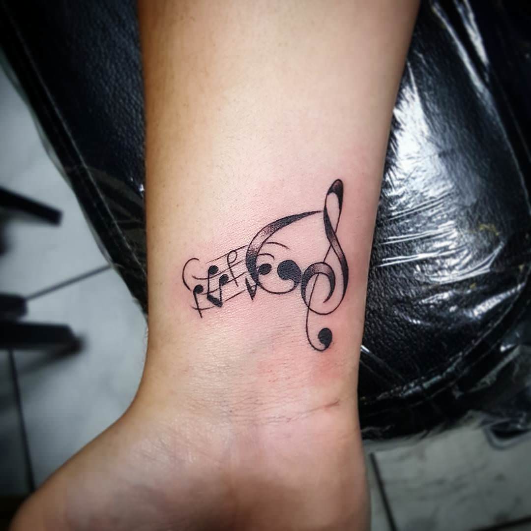 music note symbol tattoo design