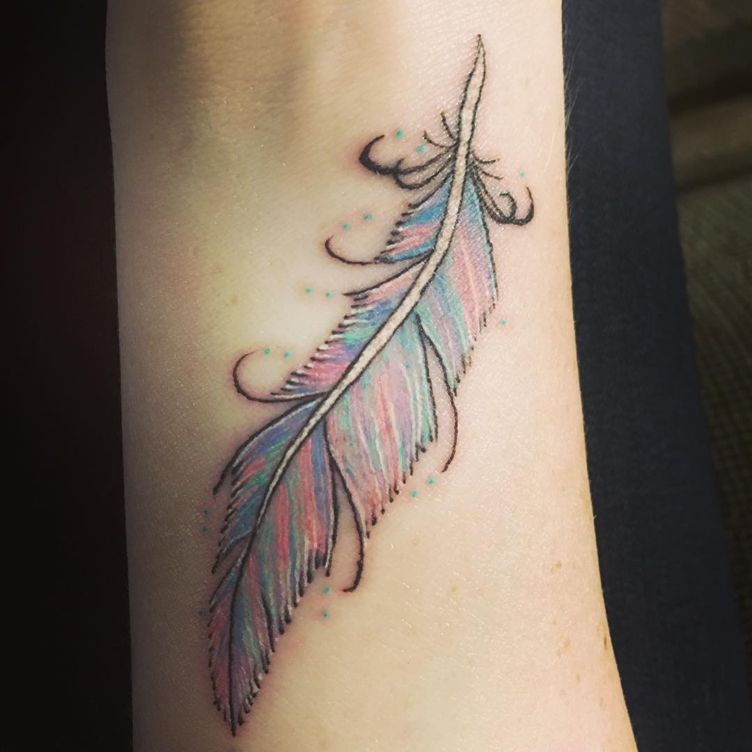 simple feather tattoo design