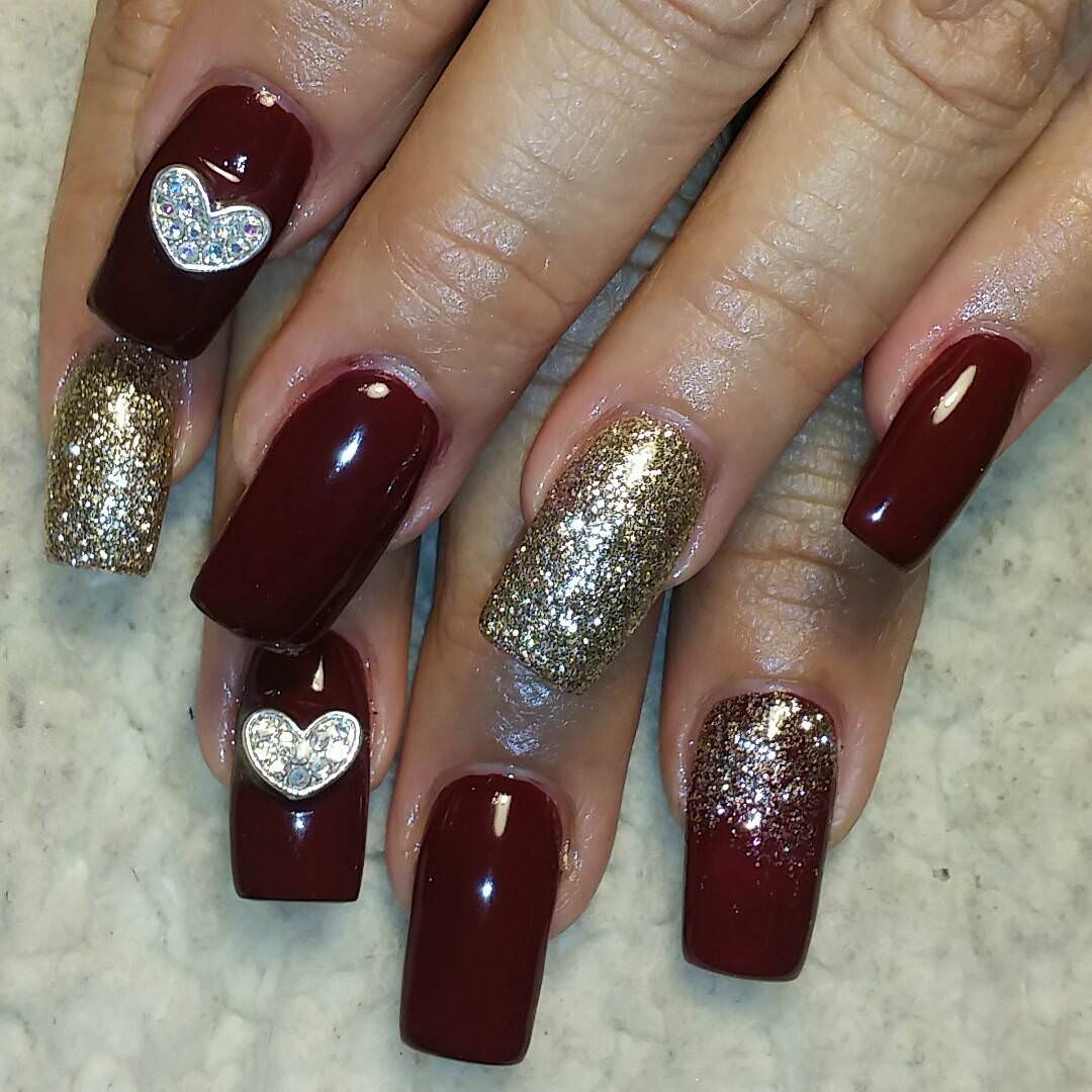 dark red and golden nail design