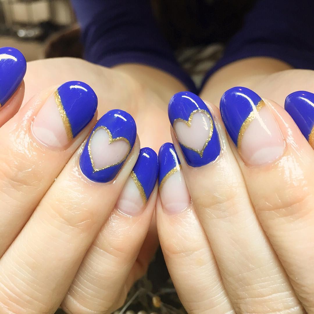pretty blue heart nail design