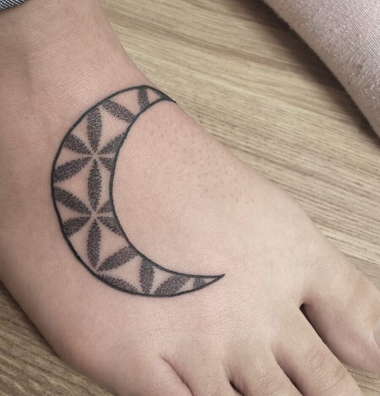 moon tattoo on foot