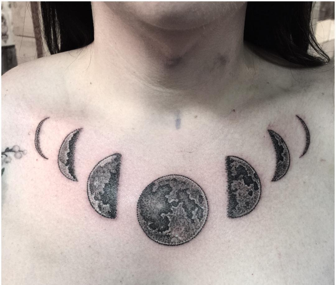 dot work moon phases tattoo below front neck