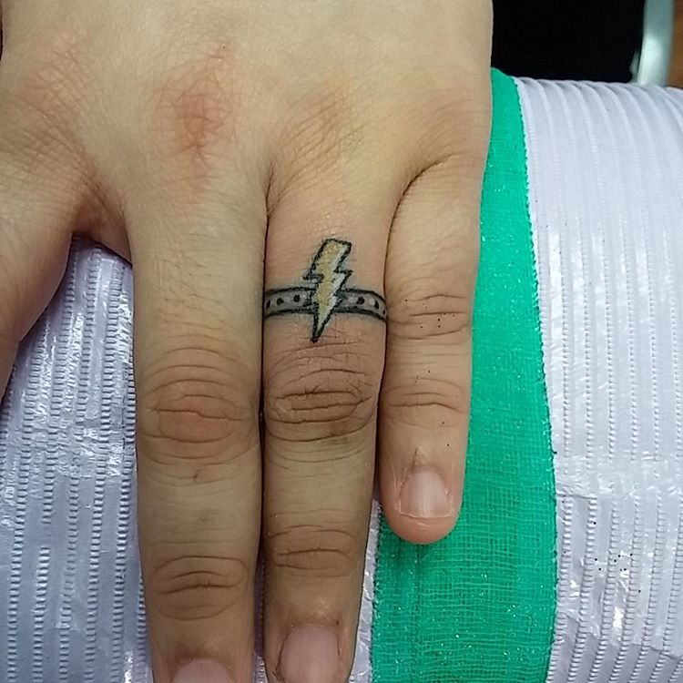 small engagement ring tattoo