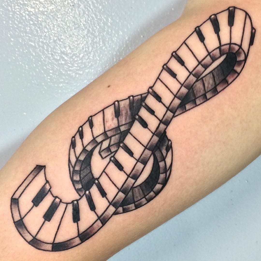 music symbol shaped piano tattoo