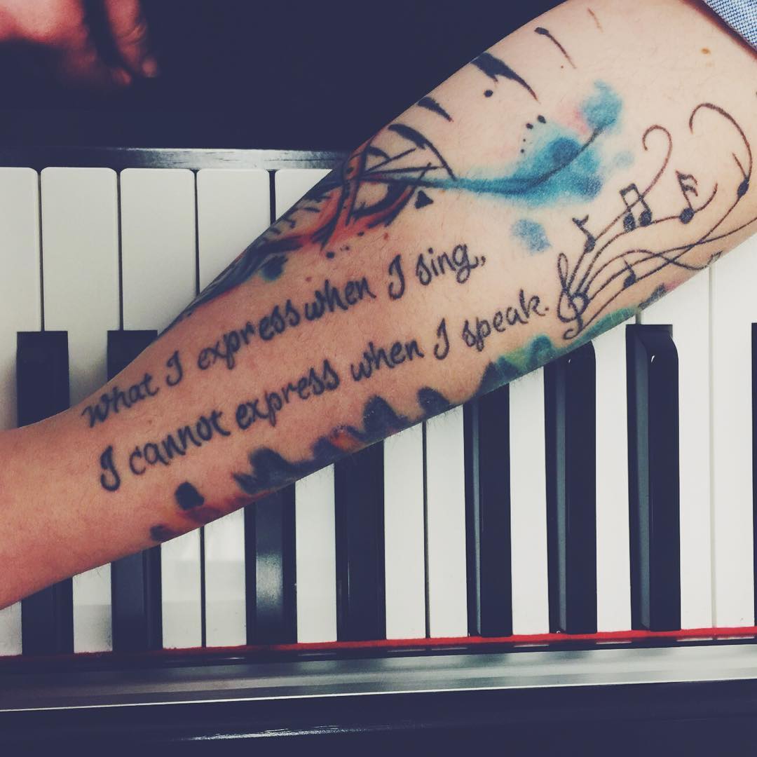 impressive tattoo of musical quote