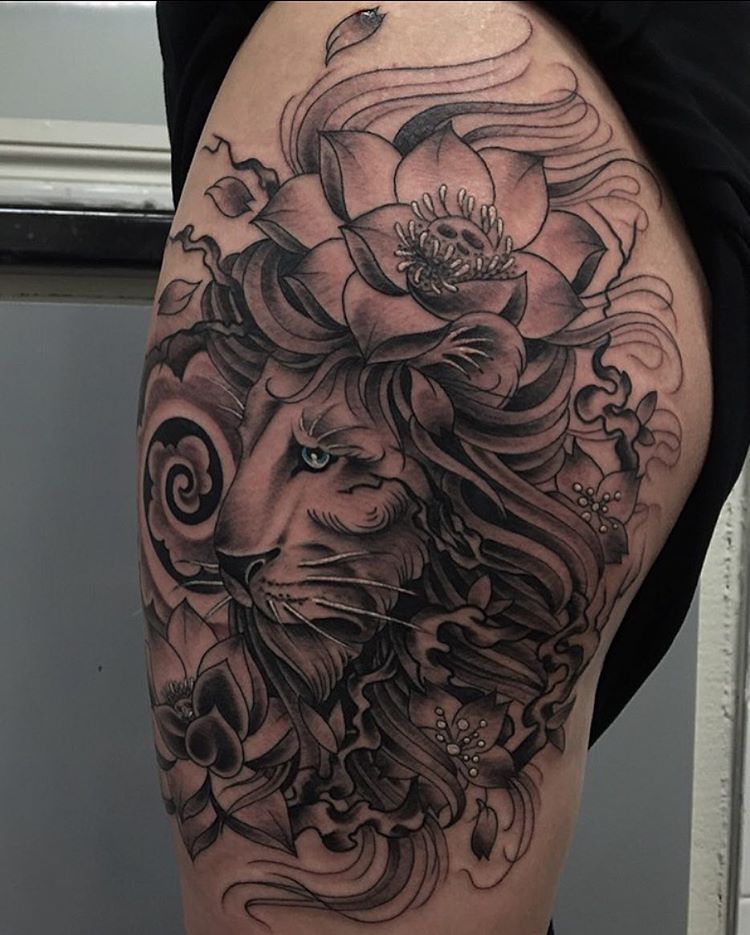 lion tattoo with lotus flower