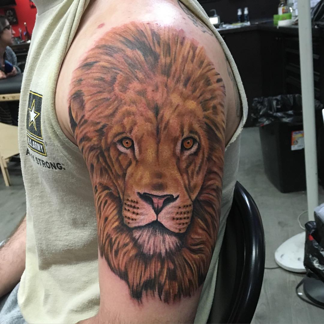 man with the lion face tattoo