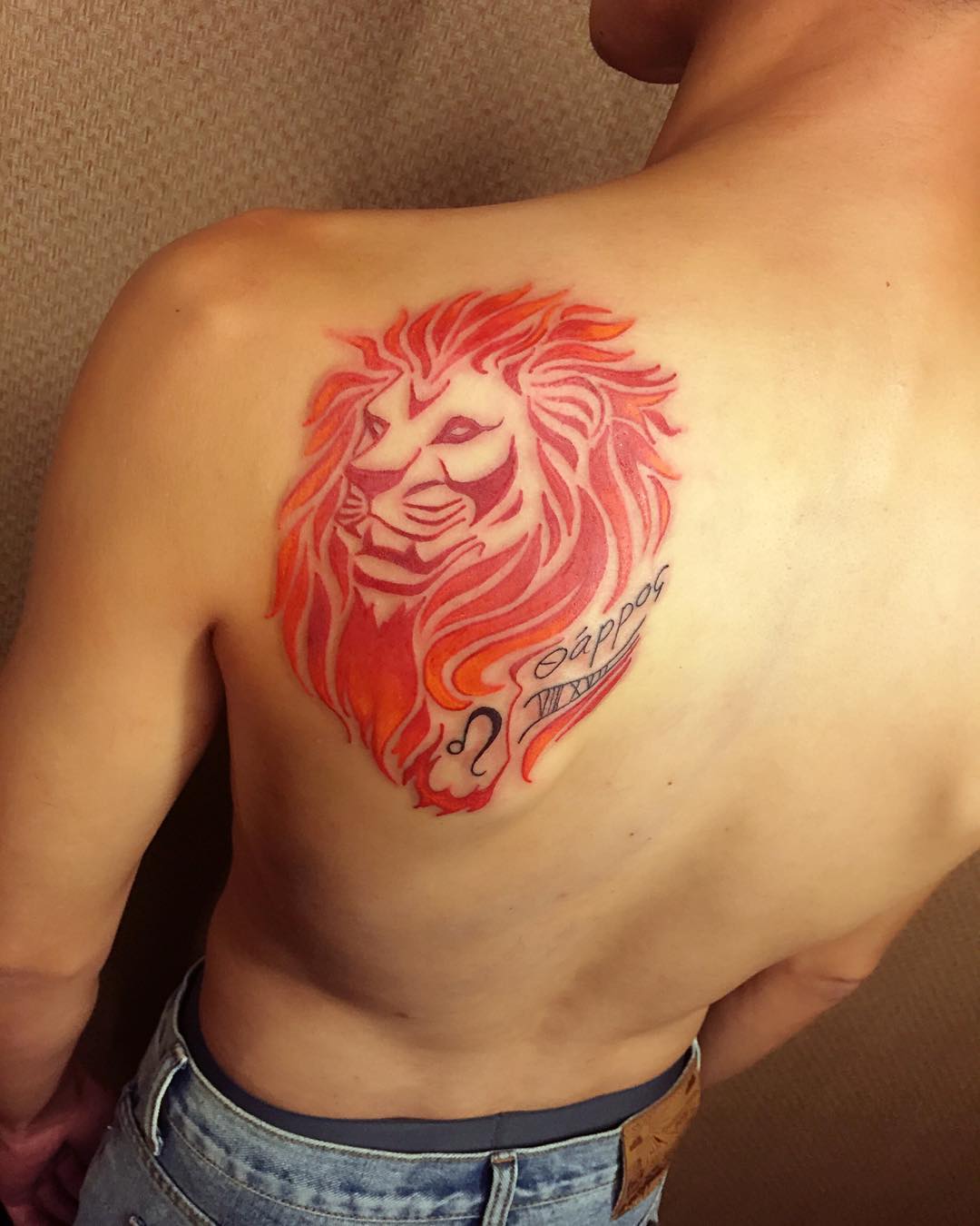 colorful leo tattoo for girls