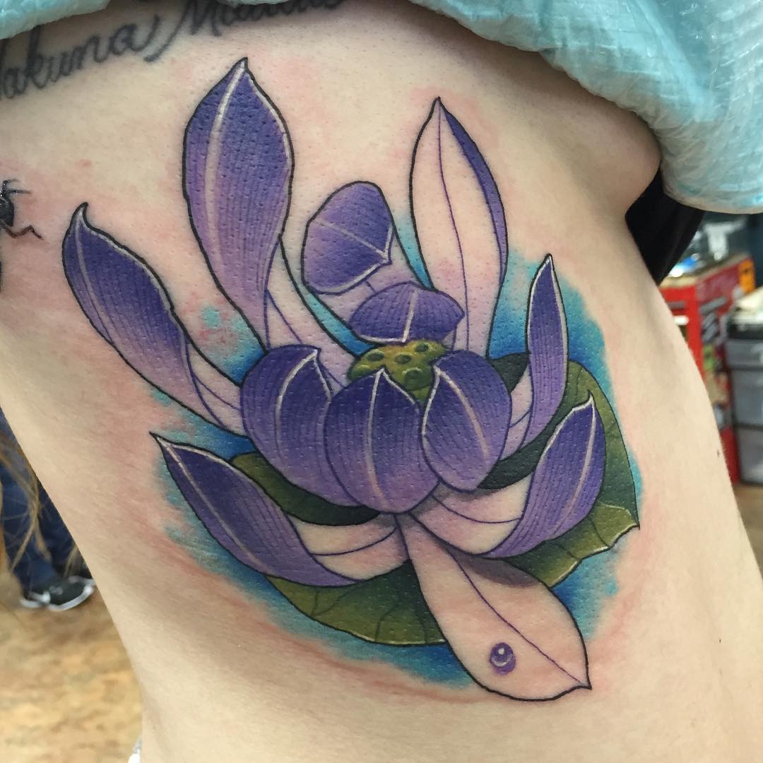 blue lotus hip tattoo