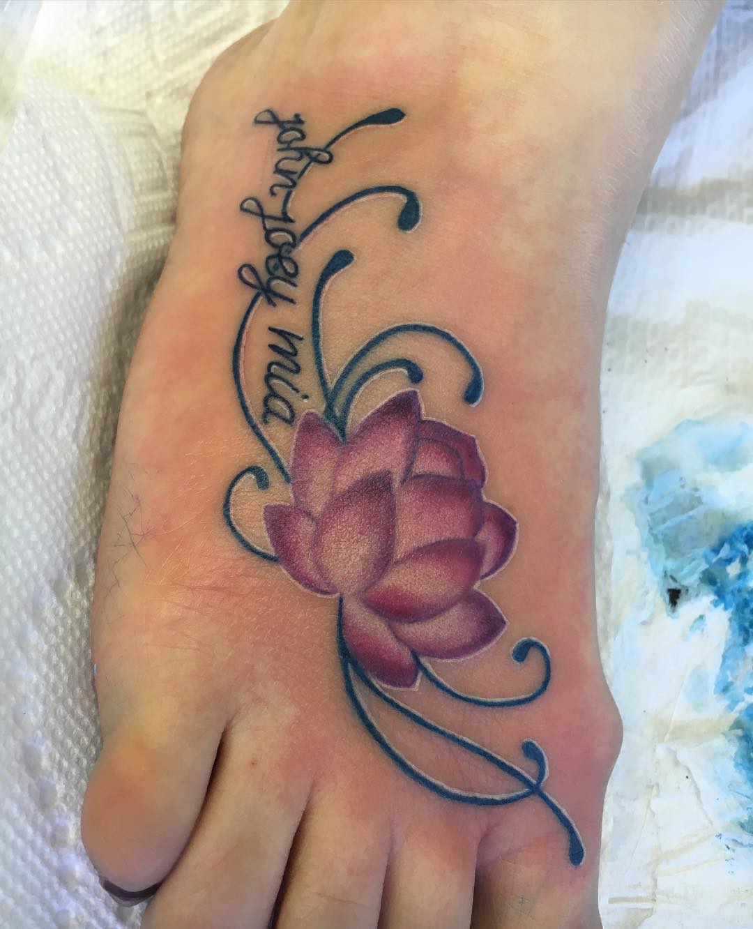 lotus tattoo on foot