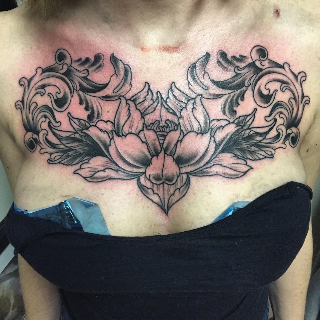 big lotus chest tattoo