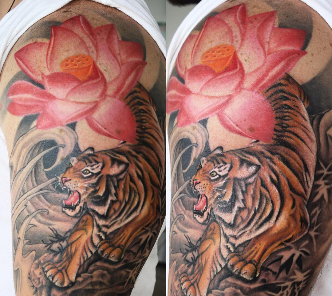 lotus and tiger arm tattoo design
