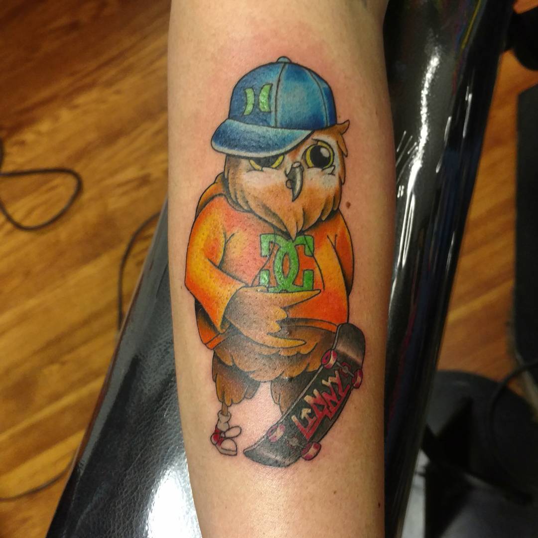 funky colored owl tattoo art