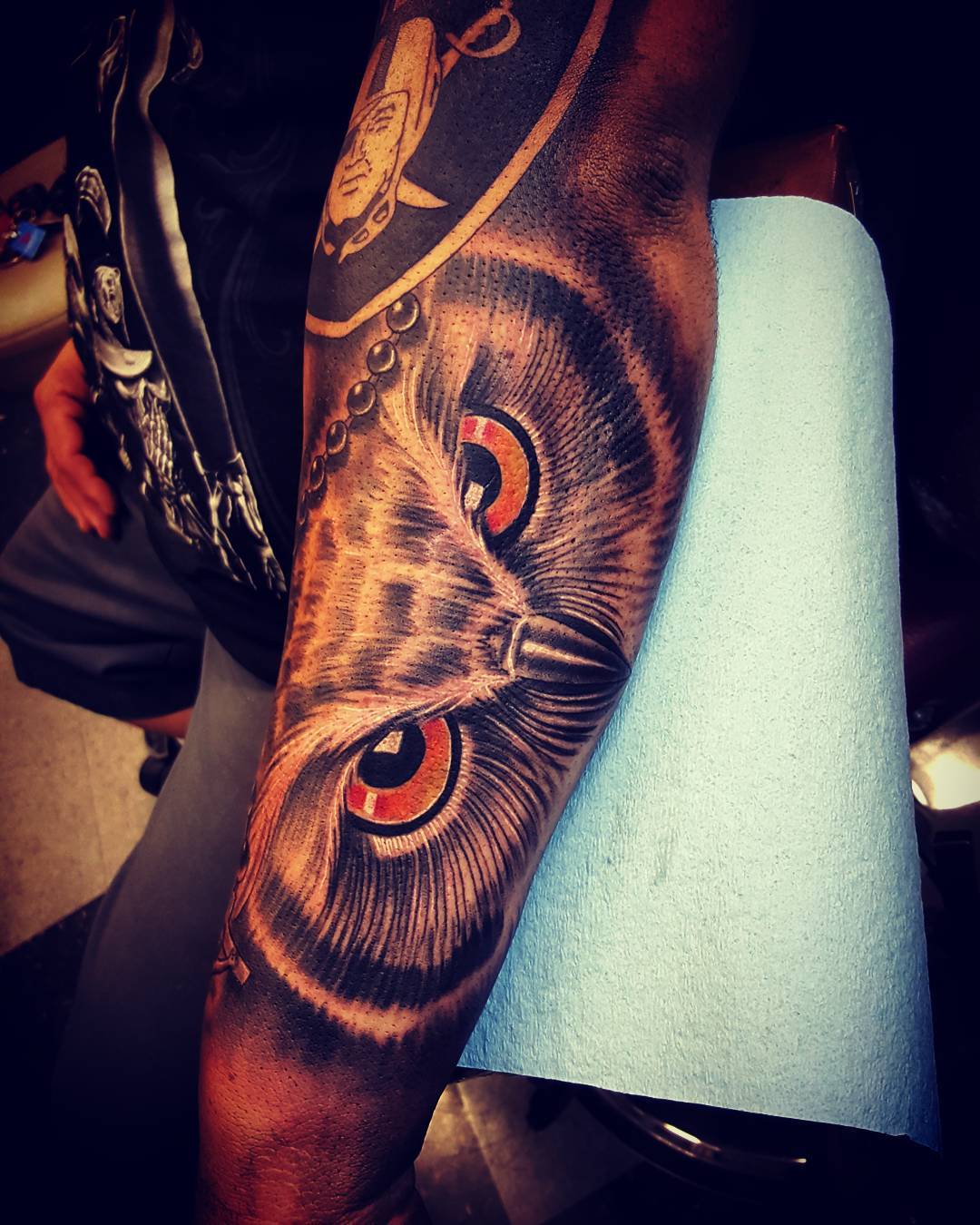 big eyed owl sleeve tattoo
