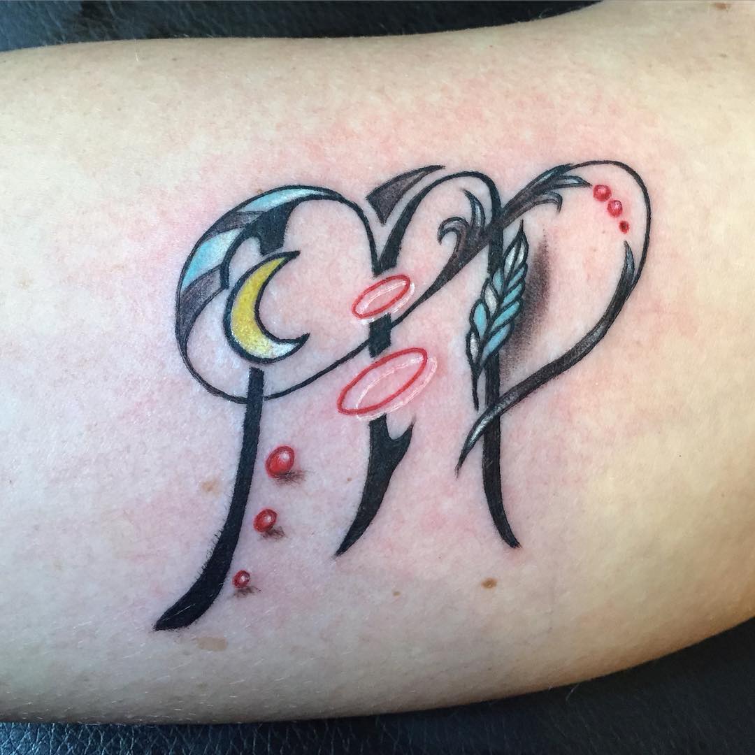 virgo tattoo with moon and feather