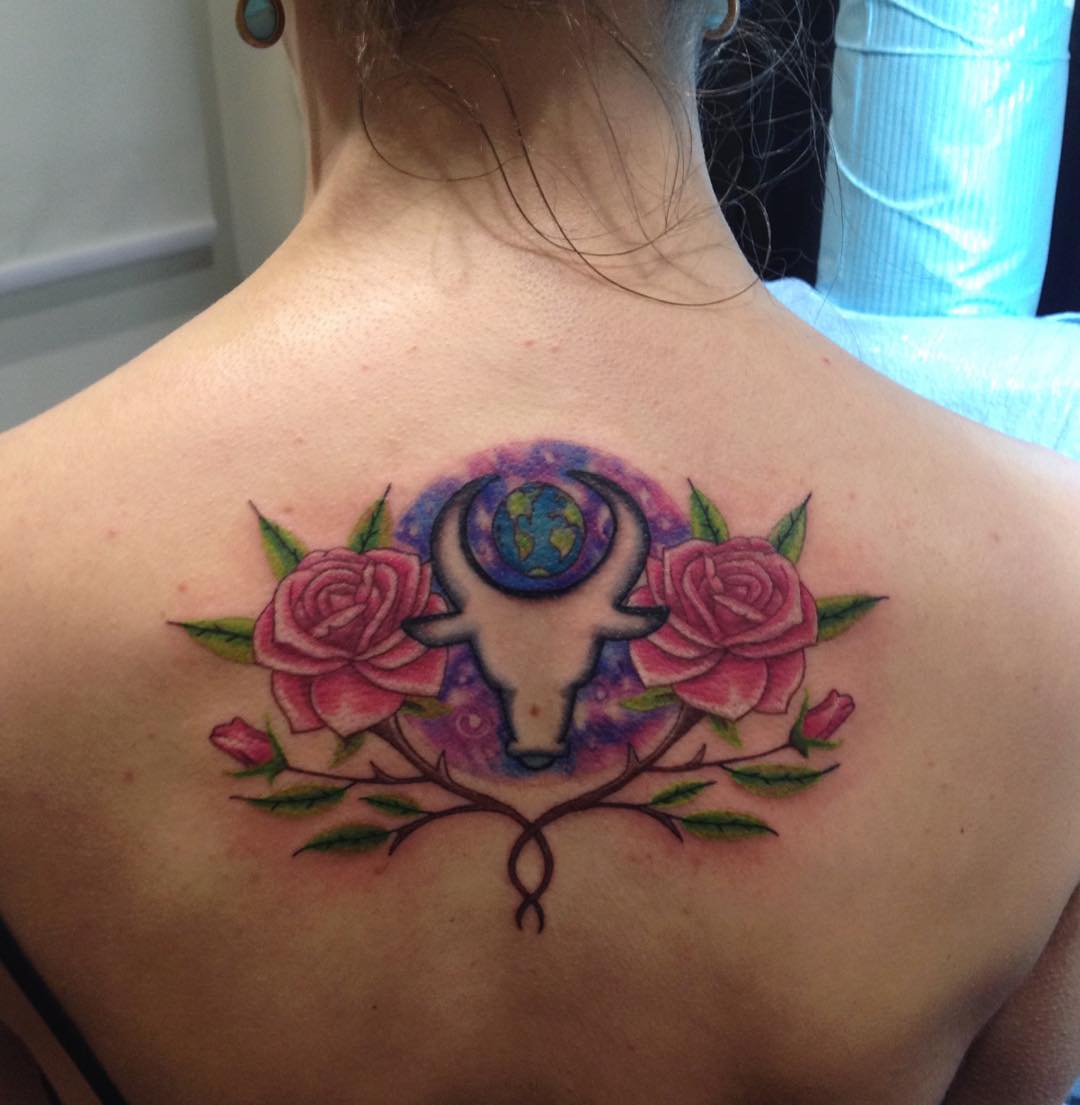 taurus tattoo with rose flowers