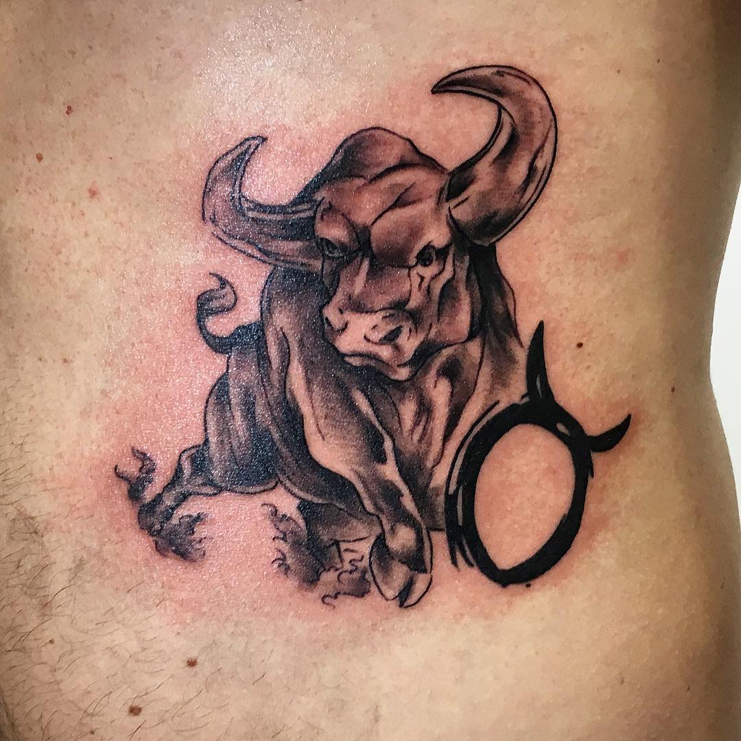 bull tattoo art on hip