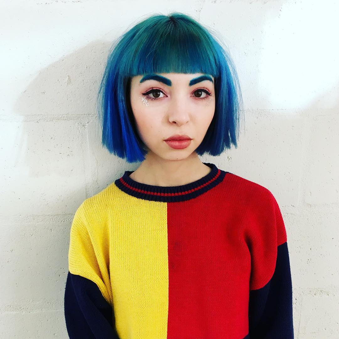 blue and green colored classic bob hairstyle