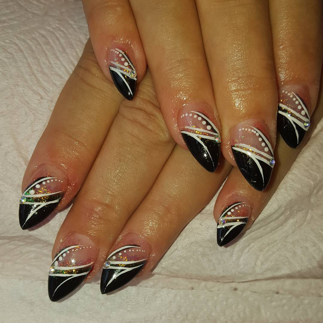 black glitter pointy nail polish design