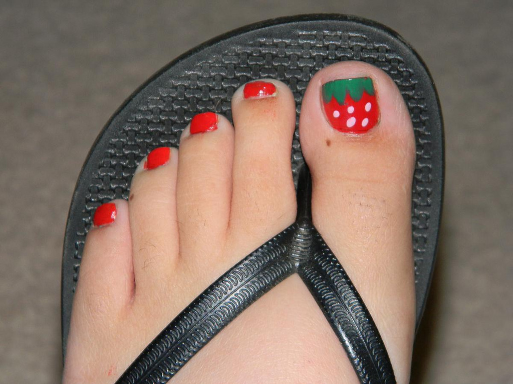cute strawberry nail art on toes