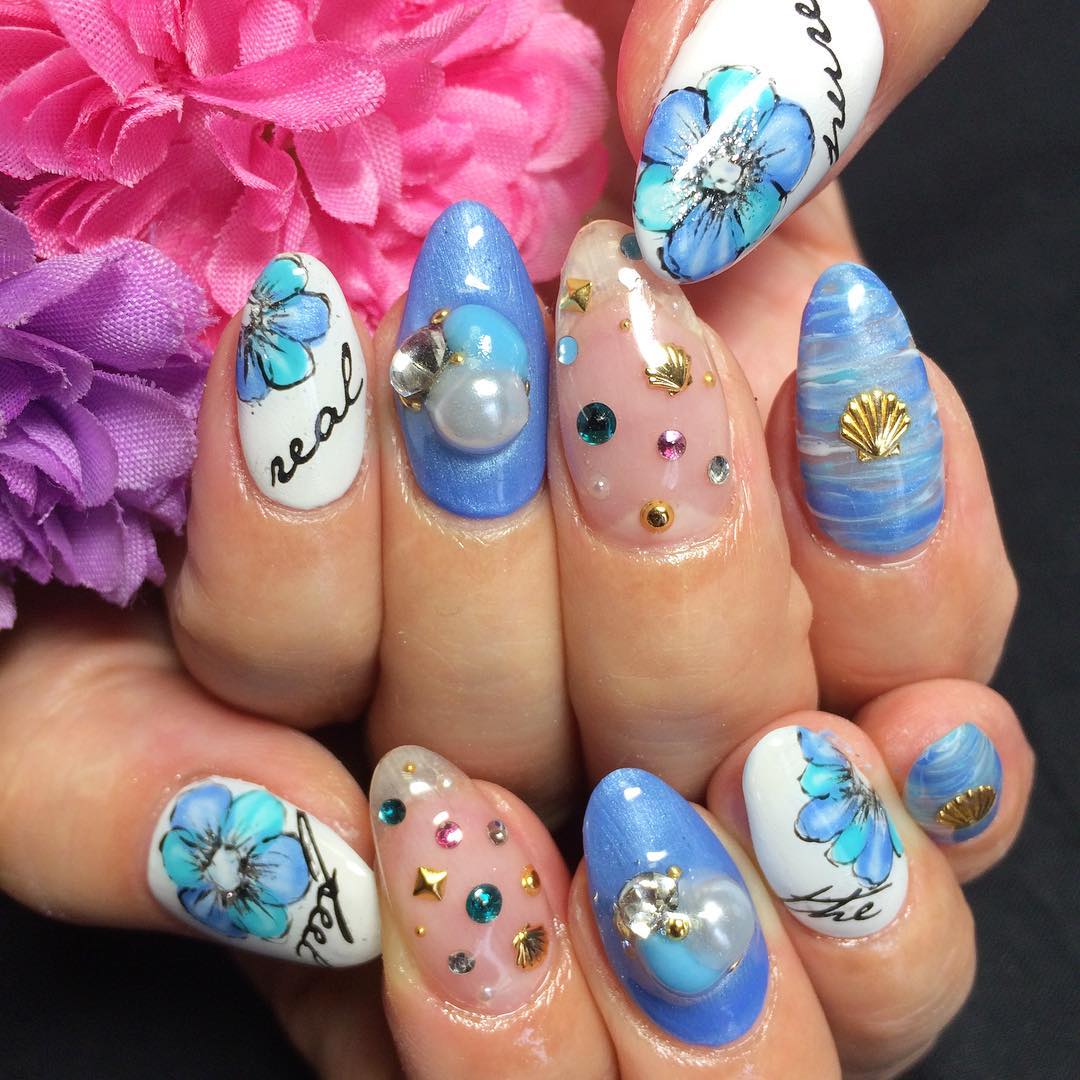 blue color flowered spring nail design