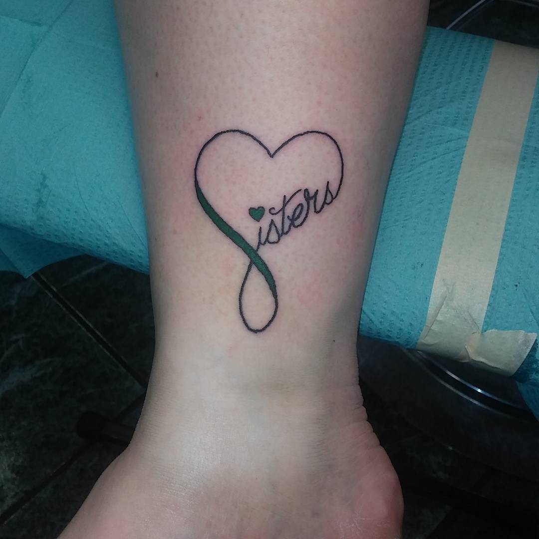 attractive text ankle tattoo