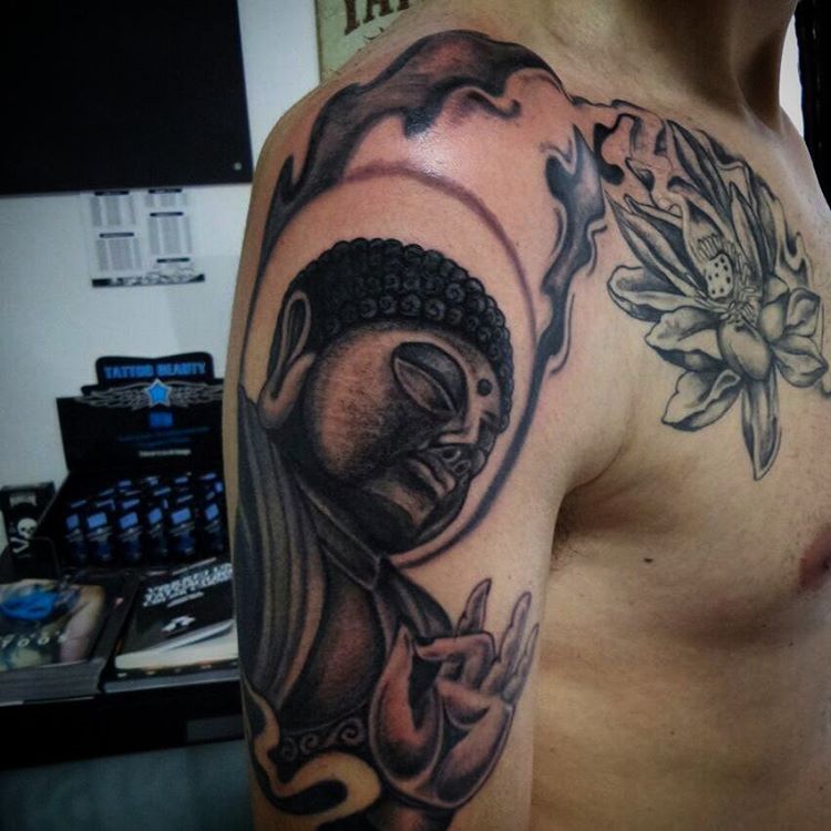 treditional buddha tattoo