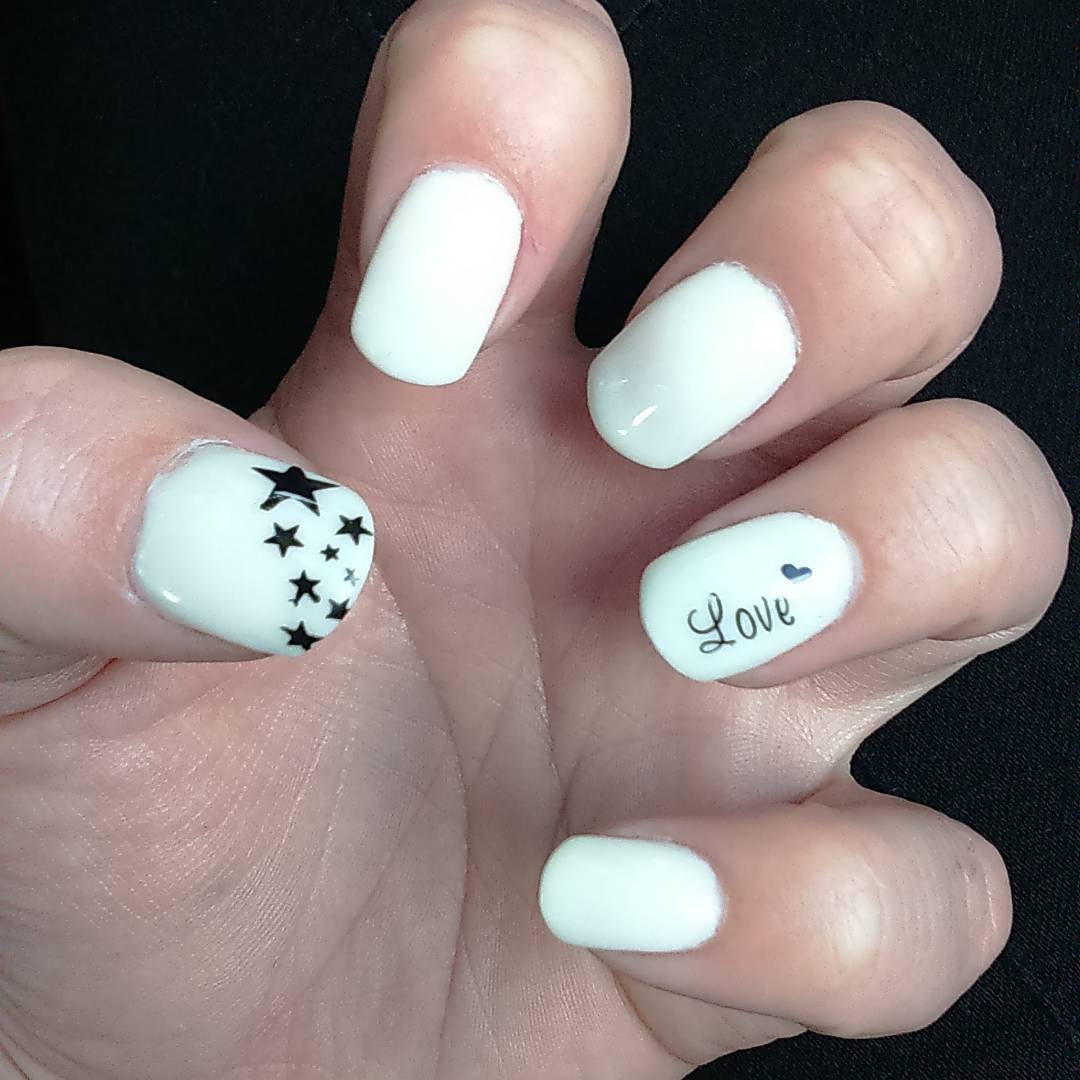 white acrylic nails with stars design
