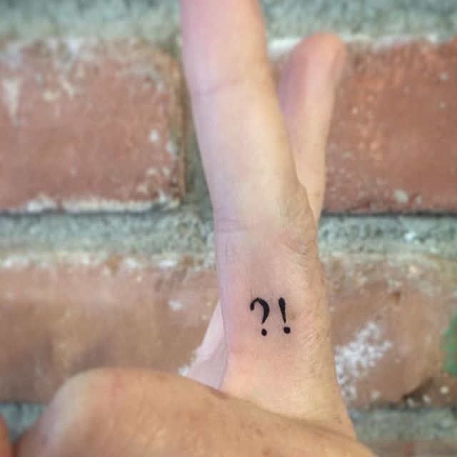 queastion mark finger tattoo