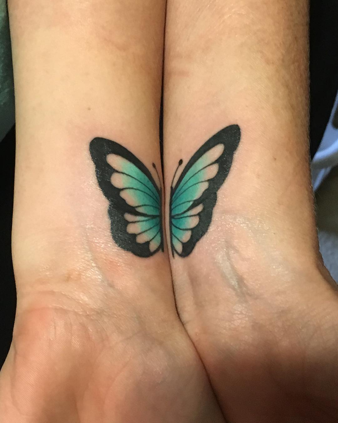blue butterfly mother tattoo design
