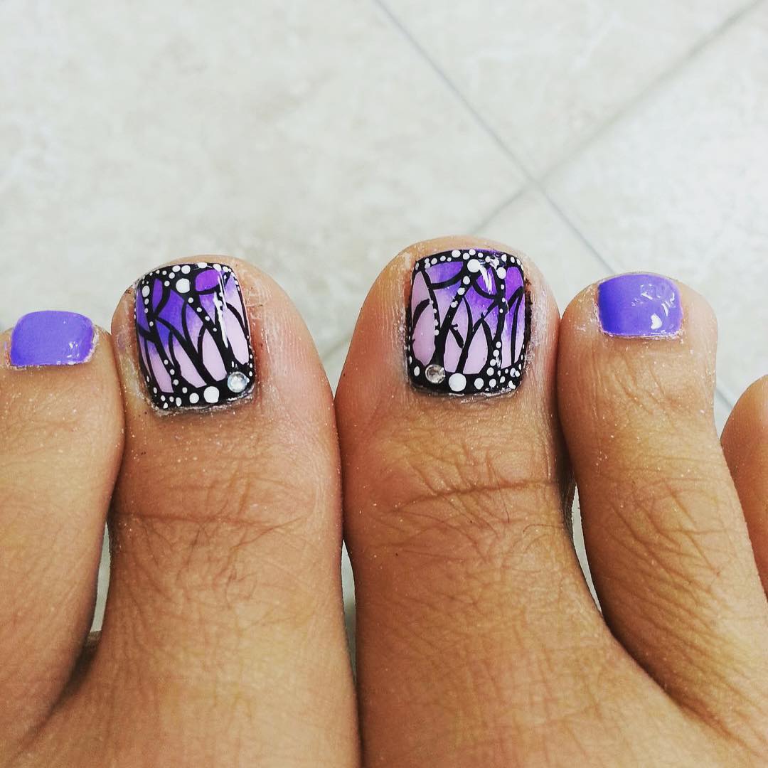 butterfly nail art design on toe nails