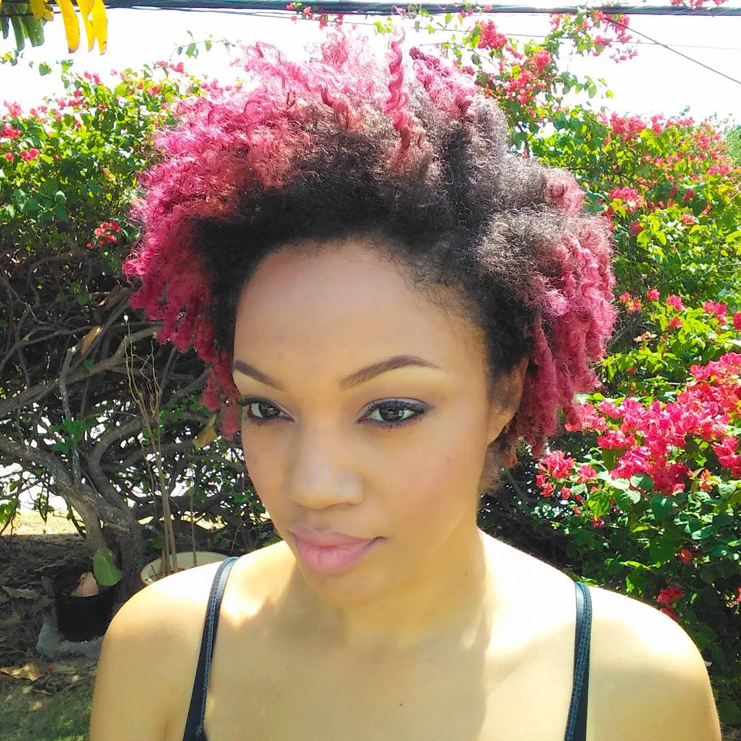 pink and black curly tapered haircut