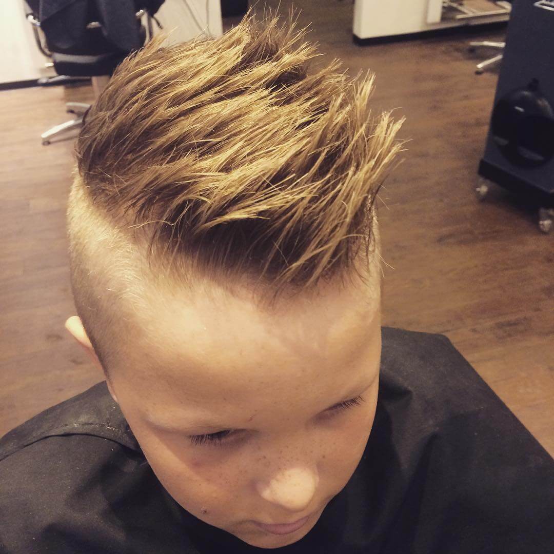 faux hawk hairstyle with side fades