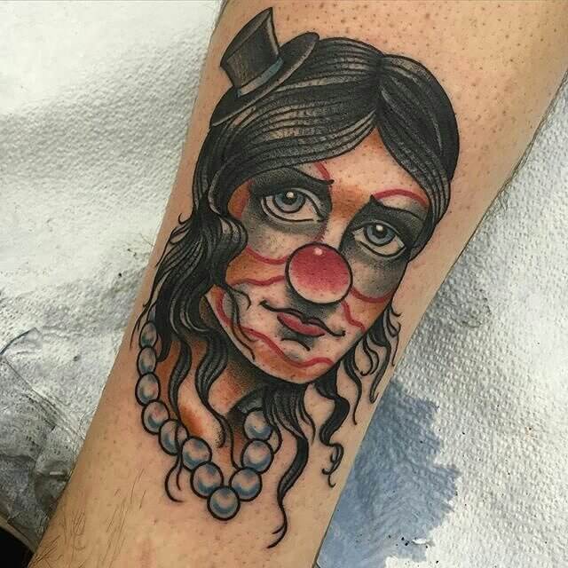 lady head clown tattoo