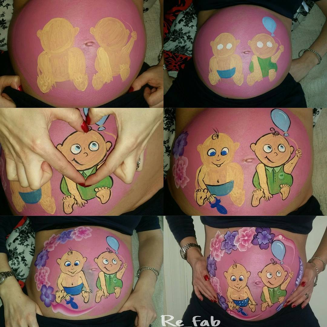 cute kids painting on stomach