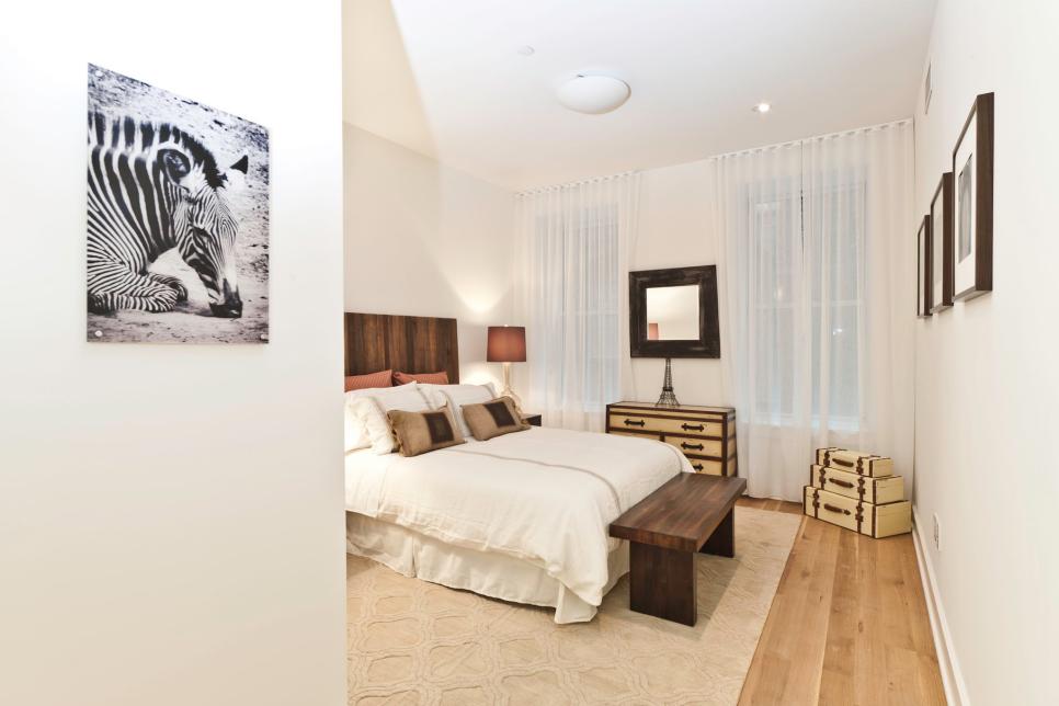 elegant bedroom with zebra artwork